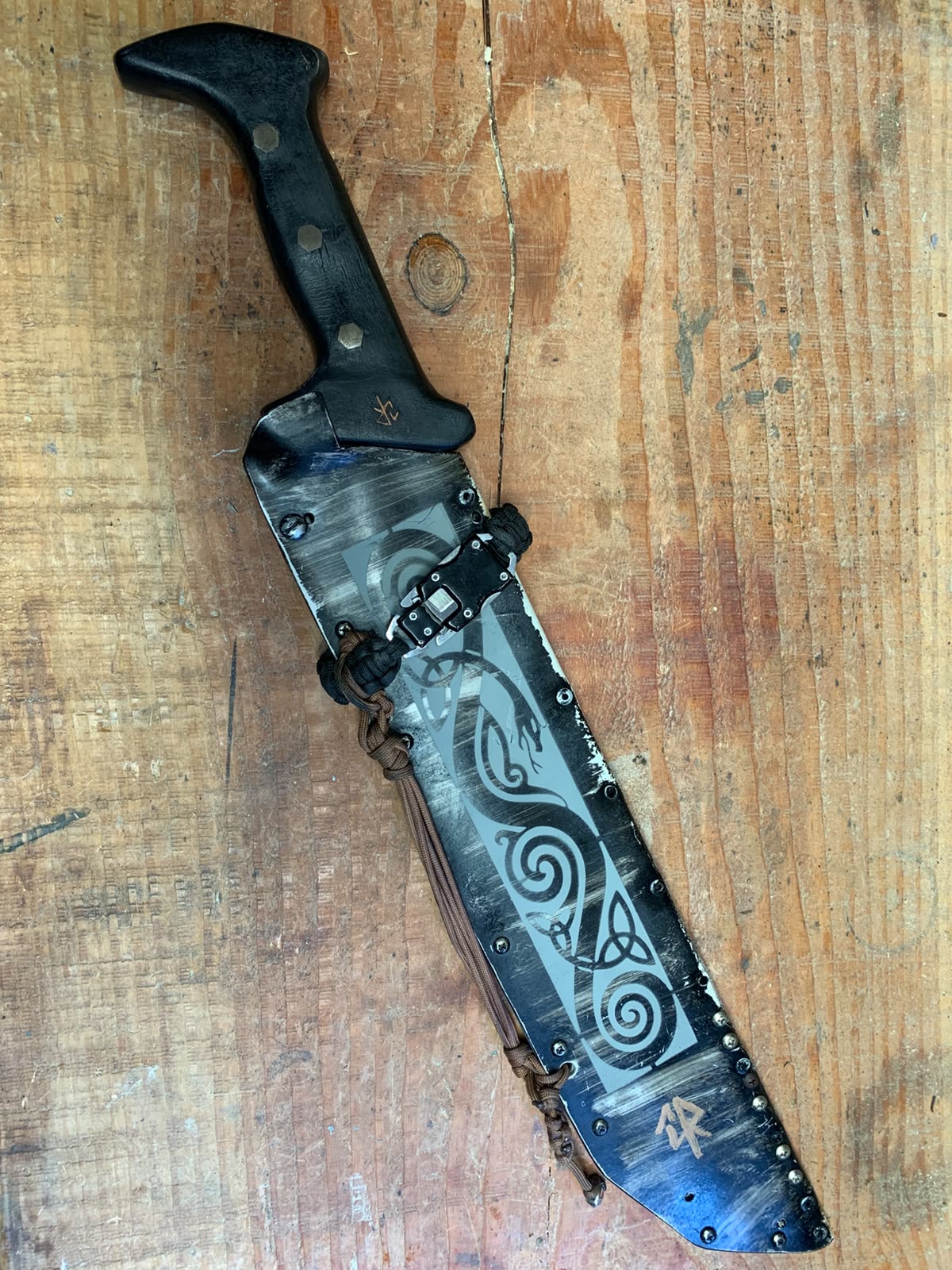 Hand-finished blade and serpent scabbard by Jack